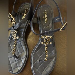 CHANEL Black Sandals with Silver Chain Accent